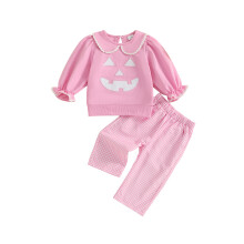(12-18 Months, Pink) Zestaw 2 strojów na Halloween dla dziewczynki: bluza z haftowaną dynią i spodnie w kratę.