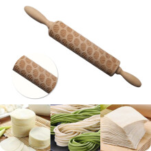wooden rolling pin with easter egg pattern for home baking