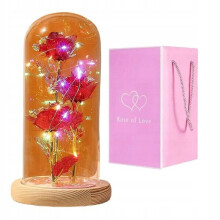Dekorative LED-Lampe in Rosenform, 21 cm hoch, mit transparenter Kuppel und Kunststofffuß, batteriebetrieben.