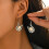 (4474) Bohemian U-Shaped Alloy Earrings with Pine Stone 5