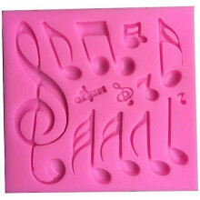 Molde de silicona no tóxico que emite notas musicales, reutilizable y duradero para decorar pasteles.