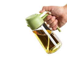 Glazen oliespuit met metalen deksel en ergonomische handgreep voor gebruik in de keuken, 470 ml.