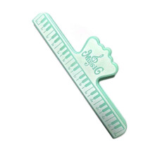 Sheet Music Page Holder with Piano Keyboard Pattern and Secure Page Grip for Musicians
