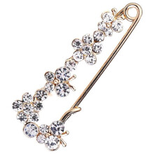 Broche ornée de strass étincelants, fermeture à clip sécurisée pour vêtements, accessoire élégant en alliage pour robe, veste ou sac.