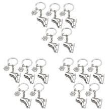 15 Packungen Schlittschuhe Schnee Flocke Schlüssel Anhänger Geschenk 3D Schlittschuh Schlittschuh Schlüssel Anhänger für Wintergeschenk
