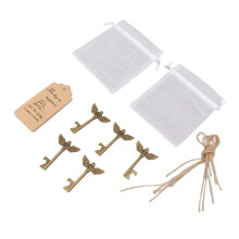 Set di apribottiglie con chiavi a forma di ali d'angelo vintage, confezionato con tag in cartoncino