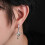 Boucles d'oreilles en forme de croix sur le thème de l'hiver, en 2
