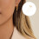 Boucles d'oreilles robustes avec pompons fluides et zircons 2