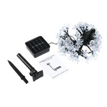 Solar lichtslinger van 7 meter met 50 LED's in perzikbloesemmotief, 8 standen, warm wit, voor feestjes, tuin, huis en festivals.