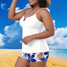 Conjunto de biquíni tankini plus size feminino com estampa tropical de folhas, com bojo embutido, ideal para praia e piscina.