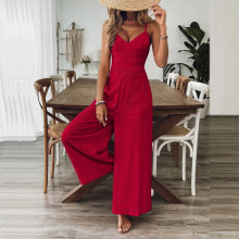 Tuta intera da donna senza maniche con scollo a V e gamba larga, spalline regolabili e fiocco sul retro, colore rosso, ideale per primavera/estate.