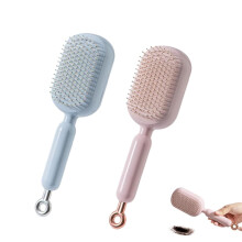 Retractable massage comb, one-pull cleaning and anti-static comb, styling tool suitable for all hair types, massage comb with retractable bristles.