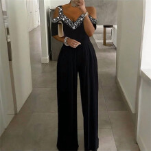Plus size damejumpsuit med V-hals, korte ærmer og vide ben, elegant sommerjumpsuit, sort, S