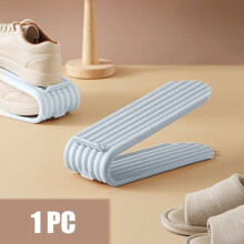 Sapateira compacta de 2 camadas, organizador de sapatos ajustável em PP na cor azul escuro, solução de armazenamento exclusiva para tênis e botas.