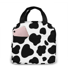 Sac à lunch isotherme à motif vaches, idéal pour les pique-niques et le camping.