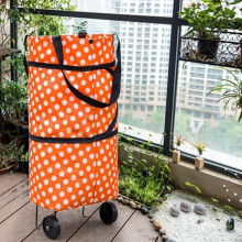 Sac de transport pliable en forme de remorqueur, en liquidation Ă moins de 10 $, couleur orange Ă pois.