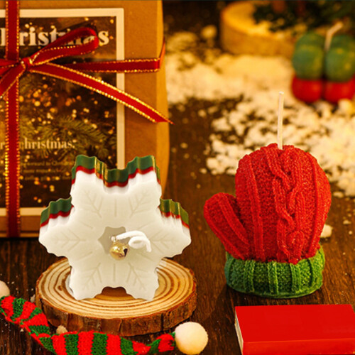 Caixa de presente com vela perfumada natalina, árvore de Natal, boneco de gengibre e decoração de vela perfumada.