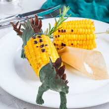 Suporte para espiga de milho em formato de dinossauro, reutilizável e multiuso, com pino duplo e ponta de aço inoxidável para churrasco e
