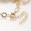 Pulseira com pingente de concha, estrela-do-mar cravejada de strass e pérolas de vidro. 3