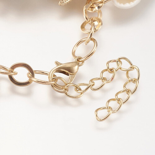 Pulseira com pingente de concha, estrela-do-mar cravejada de strass e pérolas de vidro. 2