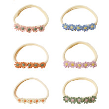 Faixa de cabelo floral fofa para bebê, moderna e flexível, feita de material macio para aventuras diárias e celebrações.