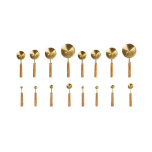 Measuring cups and spoons in a set of 16, wooden handles with metric and US measurements, stainless steel, for cooking and baking
