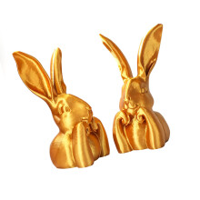 Traditionelle goldene Hasenstatue mit traditionellem-2 Packung