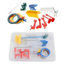 Kit XCP pour système de positionnement de film radiographique dentaire : porte-positionneur, localisateur d’instruments et outils de réglage.