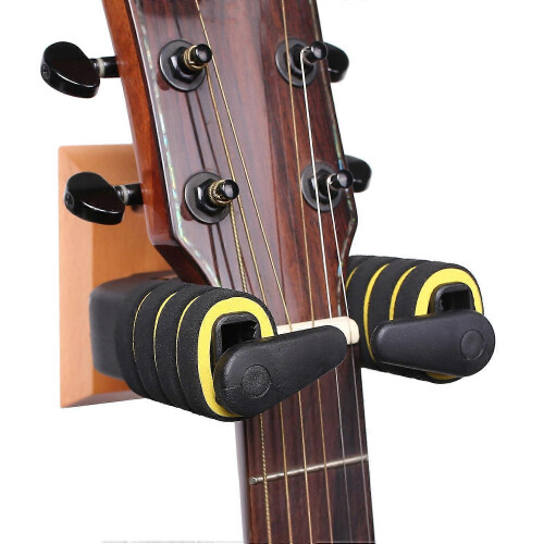 Supporto per chitarra da parete con bloccaggio automatico, compatibile con chitarre acustiche. 1