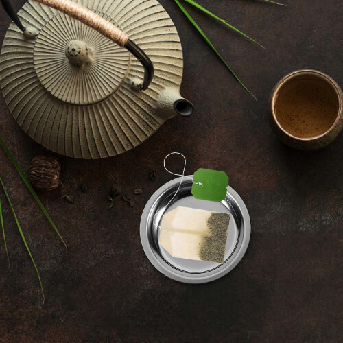 Runde, dekorative Untertasse aus Edelstahl für Teebeutel, ideal als Kaffeetasse oder Teebeutelschale. 1