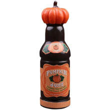 Ornamenti Creativi da Tavolo con Decorazioni di Bottiglie di Succo di Zucca Attorno al Film