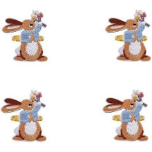 Set of 4 metal Easter bunny napkin rings with embroidered details for festive table decoration at home, hotel or party events