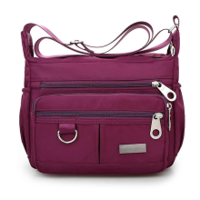 Purple women's shoulder travel handbag