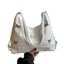 Stylish PU underarm tote bag, unique design, perfect for fashionable women who appreciate detail and quality, brown and white.