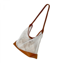 Modern openwork knit shoulder bag, breathable textured surface, ample storage space, commuter/business tote bag, brown.