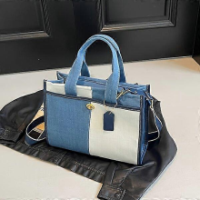 Denim patchwork tote bag, multiple ways to wear, showcasing individuality, light blue.