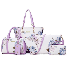 Portafogli e borse firmate da donna, borse a tracolla in pelle, borse a spalla e tote bag, disponibili in una varietà di colori e dimensioni.
