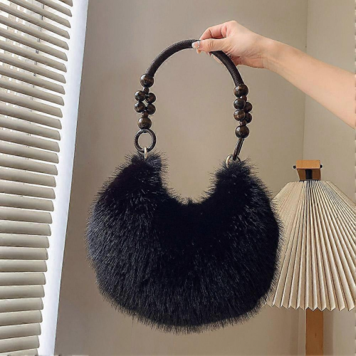 Elegante e morbida borsa a tracolla a forma di mezzaluna, soffice, capiente e casual, nera. 1