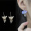 Boucles d'oreilles florales interchangeables délicates en 7