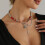 Collier de perles élégant en forme de cœur noir et rouge, avec 4