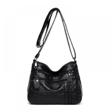 Bolsa feminina de couro macio, moderna e versátil, ideal para mães de meia-idade. Possui vários compartimentos, é pequena, casual e pode ser