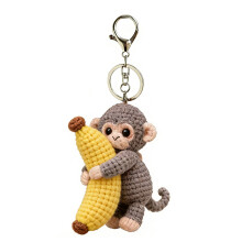 Schattige aap knuffelen banaan sleutelhanger zacht polyester