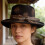Elegant Distressed Bucket Cap With Feather Accent Soft-camel1 3