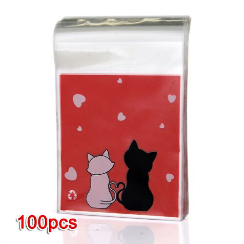 Röda godispåsar med katttryck – OPP-plast, 11x10+4cm, 100