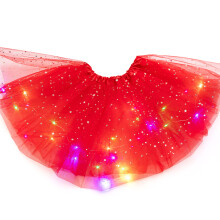 Självlysande tutu En snygg upplyst tutu med glittrande LED-tullklädselelement och genomskinliga tylllager, upplyst tutu med stjärna