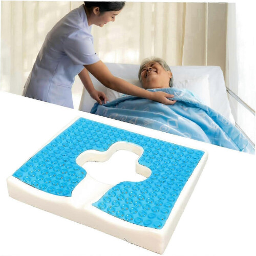 Coussin de décharge de pression pour utilisateurs de fauteuils roulants avec pente ergonomique