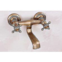 Rotatable antique faucet for wall mounted sink in copper finish