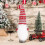 Stickad julärm till vinflaska – Festive Faceless 1