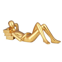 Goldene Lesefigur, Wohnaccessoires mit goldenen Akzenten, abstrakte Lesefigur aus Kunstharz, C