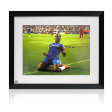 Didier Drogba Signed Chelsea Football Photo: Knee Slide Celebration. Framed